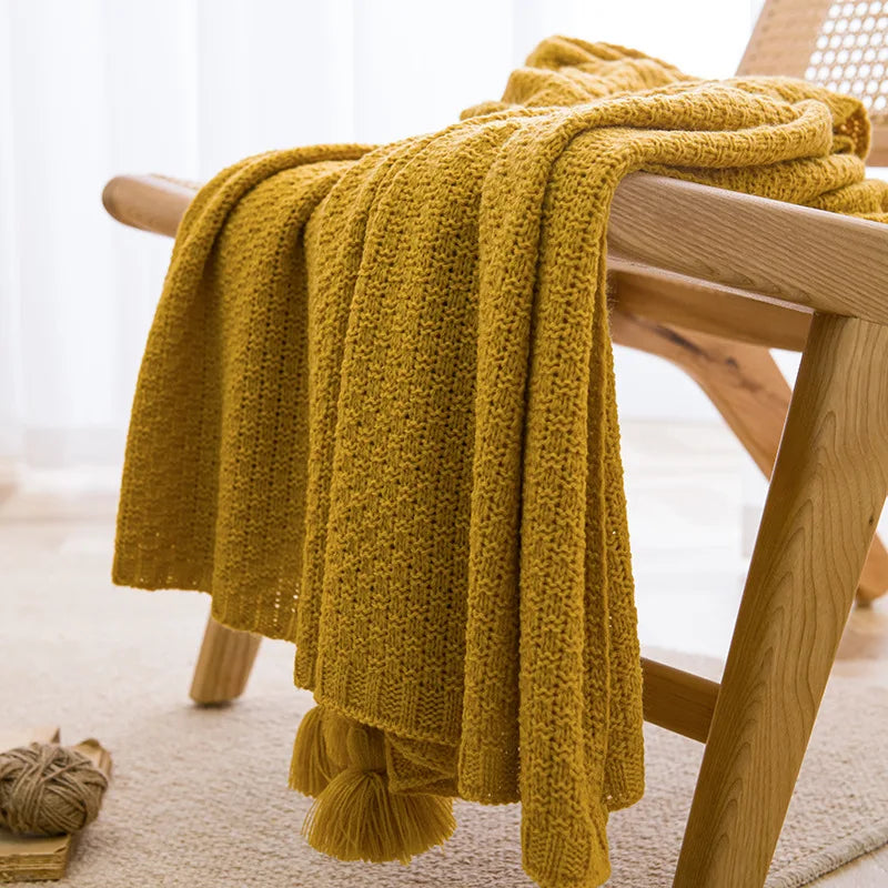 Chunky waffle knit throw with pompoms nordic style