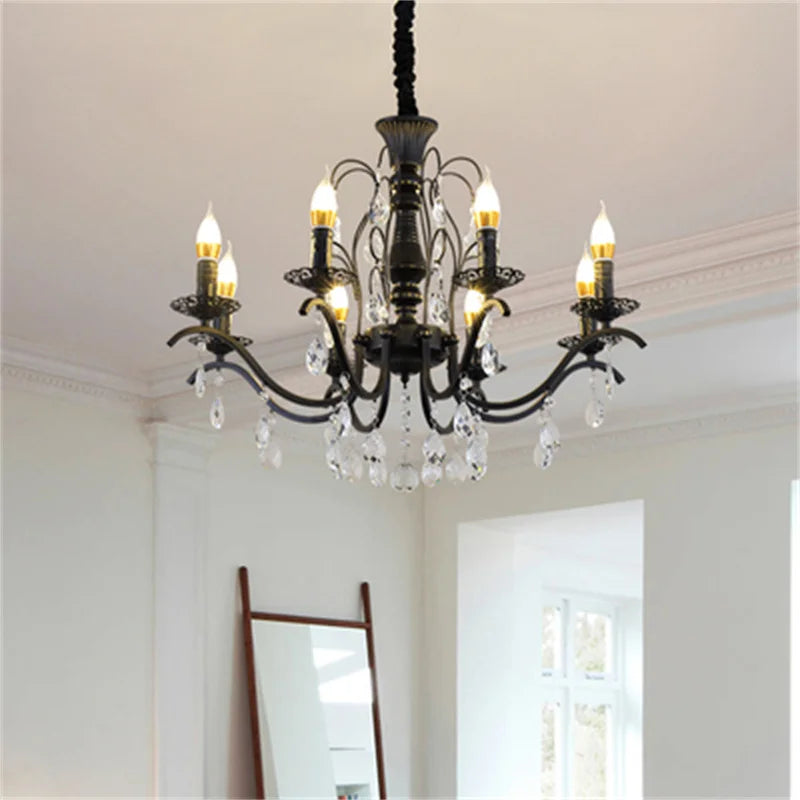 Wrought iron chandelier with crystal pendants for elegant interiors
