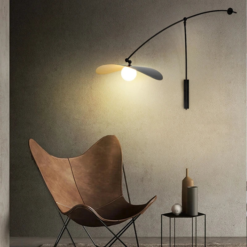 Minimalist long arm rotating reading wall light