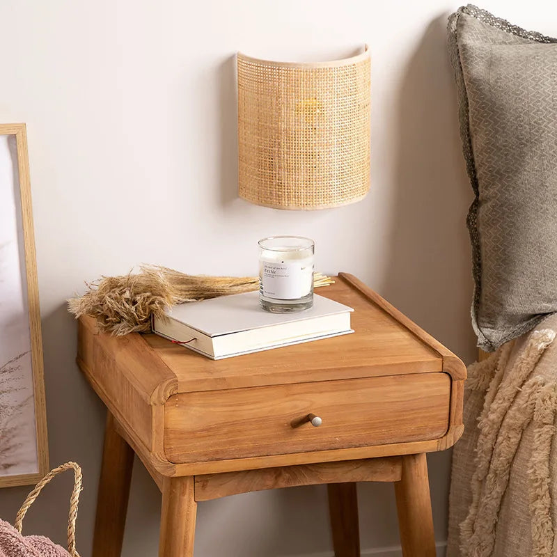 Southeast Asian style rattan wall light with minimalist switch