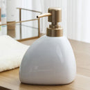 ceramic soap dispenser with gold pump for bathroom