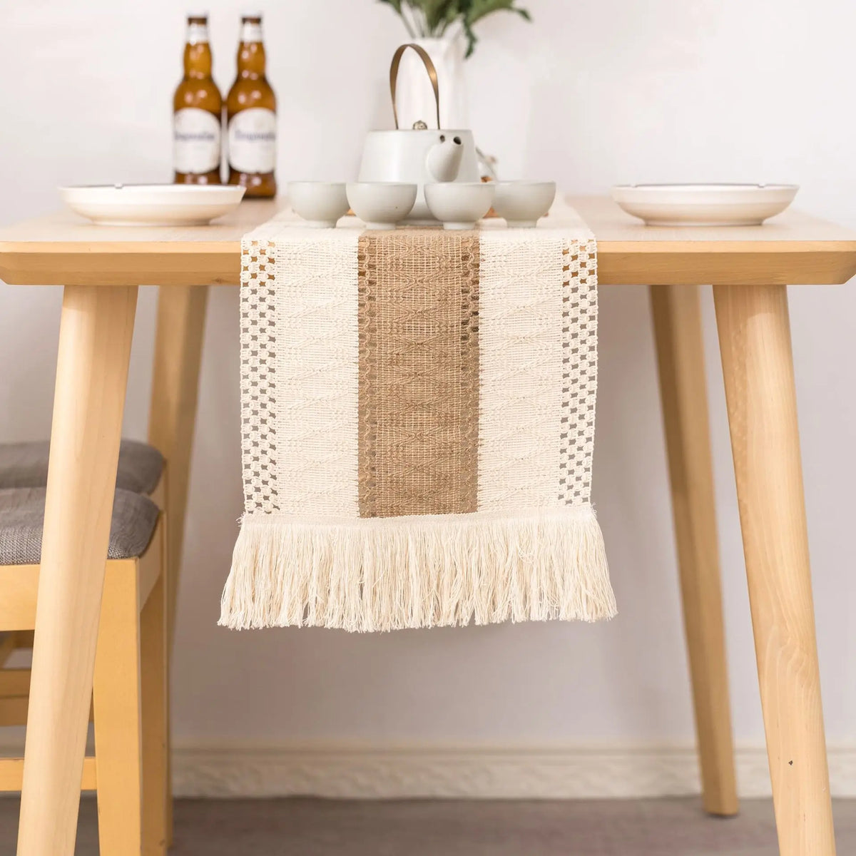 Boho cream table runner with geometric patterns and tassels