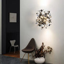Modern stainless steel wall light with decorative leaves