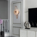 Round glass LED wall light in metal for ambient lighting