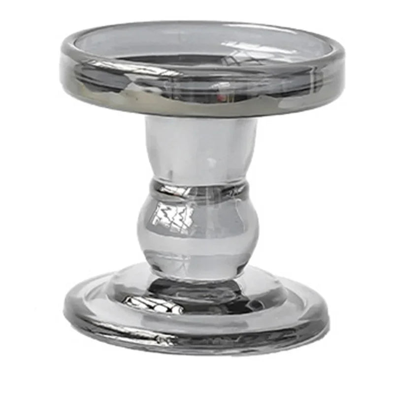 Glass tea light holder for decorative outdoor use