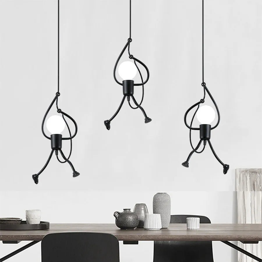 Vintage iron pendant light with cartoon little man design
