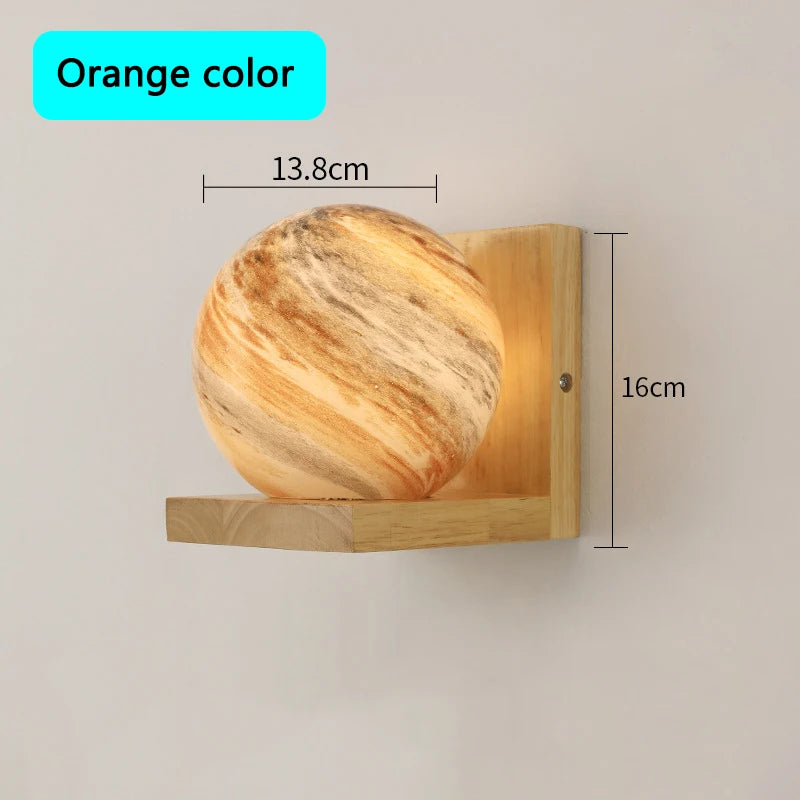 Modern wooden wall light with planet LED shade