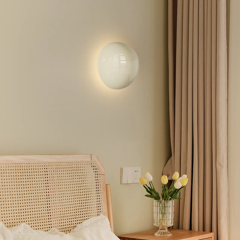 Minimalist round wall light in medieval bauhaus style