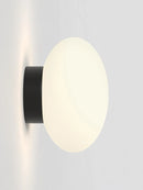 Minimalist glass wall light for modern interiors