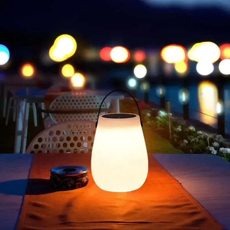 Rechargeable solar camping lamp with silicone handle