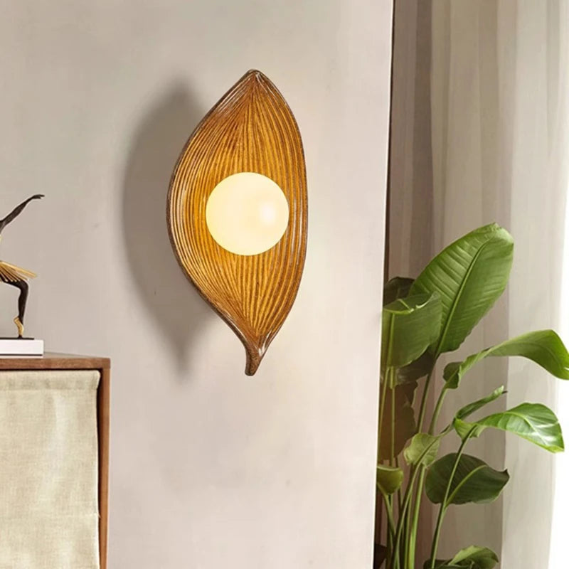 Artistic resin and glass leaf-shaped wall light for hallway lighting