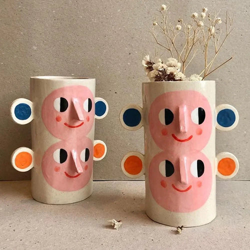 abstract ceramic vase with human face floral decoration - vue 5 sur 6