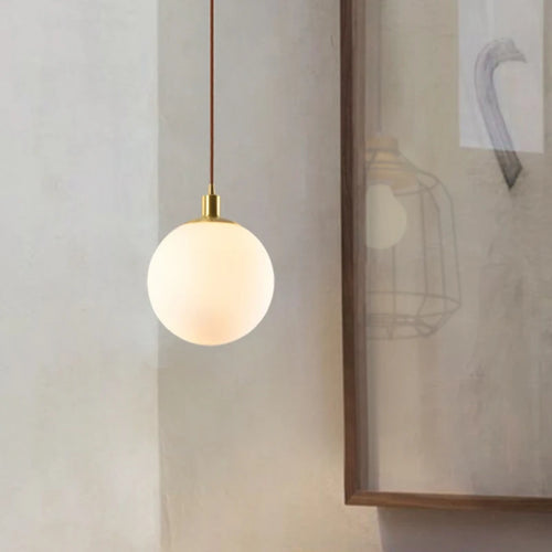 Modern minimalist brass pendant light with luminous orb - vue 6 sur 9