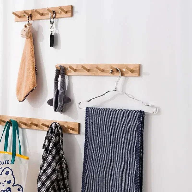 bamboo wall-mounted coat rack with practical hooks to organize your belongings