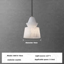 Modern pendant light in natural marble and copper with elegant design