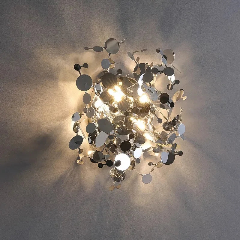 Modern stainless steel wall light with decorative leaves