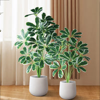 Artificial palm and monstera plants for indoor and outdoor decoration