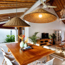 Hand-knitted rattan pendant light with minimalist shade