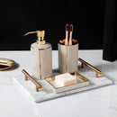 Ceramic soap dispenser and gold bathroom accessories set