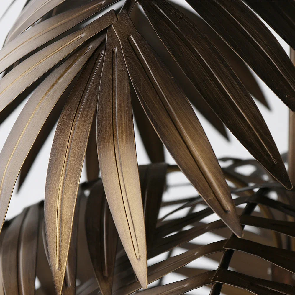 Vintage industrial chandelier with coconut leaves, tropical bohemian style