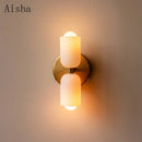 Artistic double head glass wall light for indoor use
