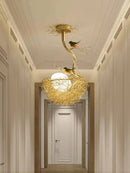 Modern LED chandelier with bird's nest design and glass ball