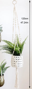 handmade macrame hanging plant holder made of natural cotton