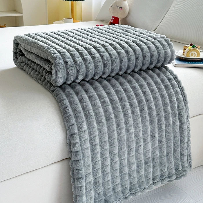 Soft faux fur effect flannel throw with checked pattern for winter