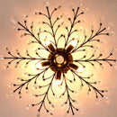 Vintage black metal chandelier with crystal pendants for modern interiors