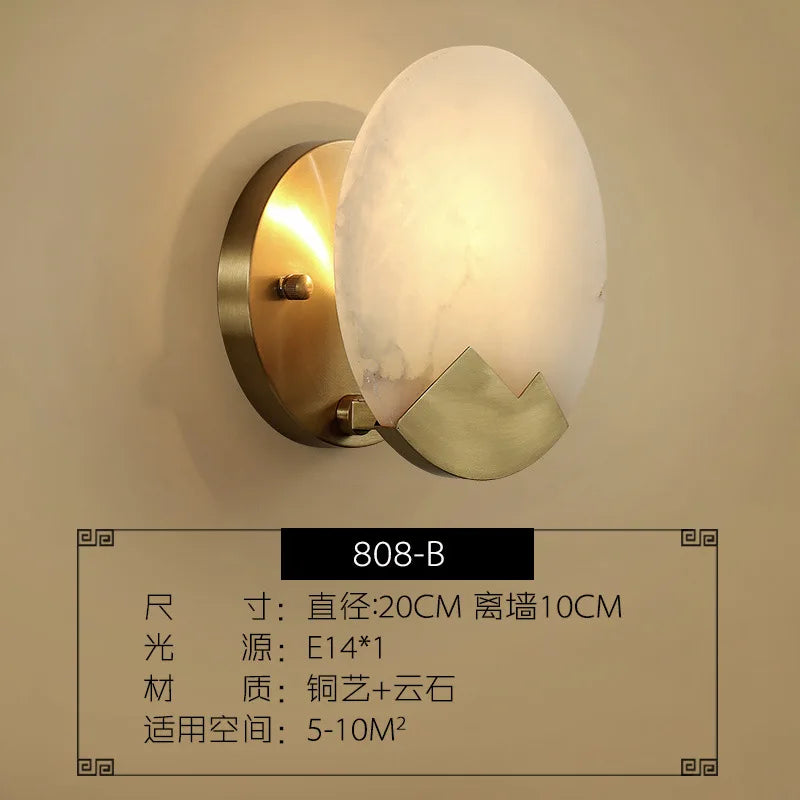 Copper wall light with marble shade and luxury mirror