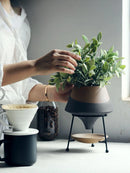 ceramic flower pot with modern metal stand