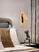 Rotating brass LED wall light with USB switch