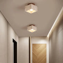 Minimalist stone ceiling light for a calming atmosphere
