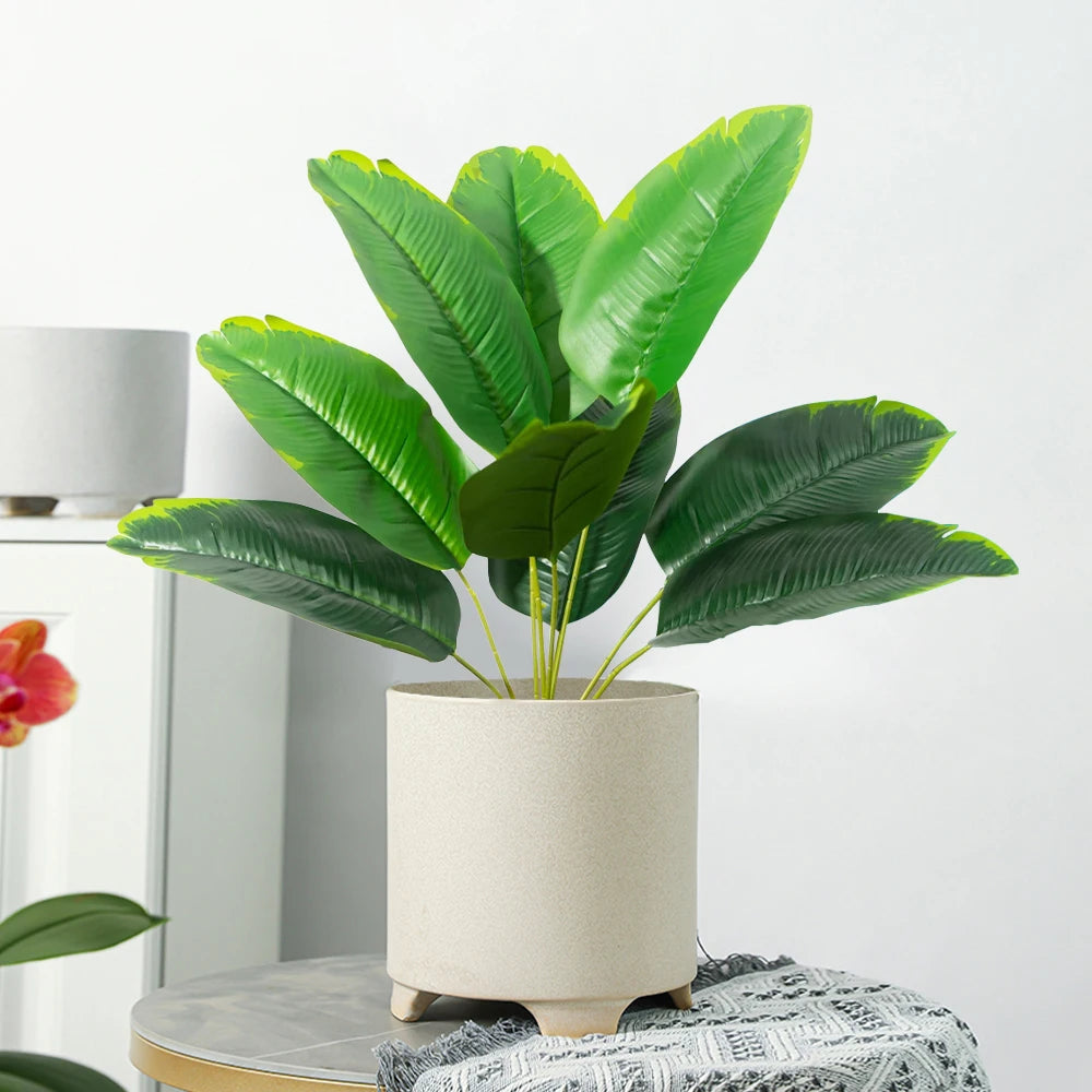 Artificial tropical monstera plant with decorative leaves for interiors