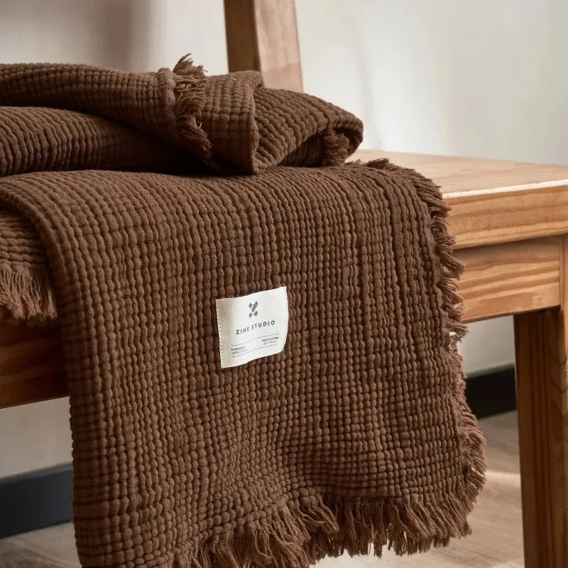 Lightweight 4-ply cotton muslin throw with tassels
