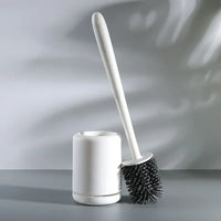 Toilet cleaning brush with wall mount and storage