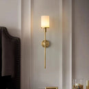 Natural marble wall light with brass bulb