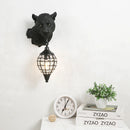 Resin leopard wall light