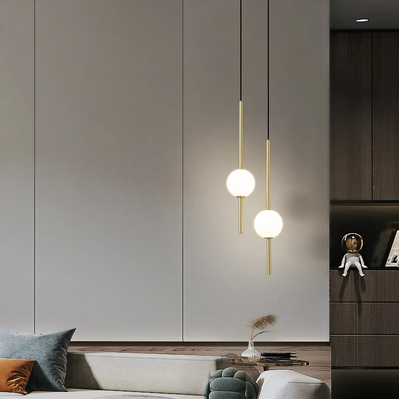 Modern brass LED pendant light with adjustable cord