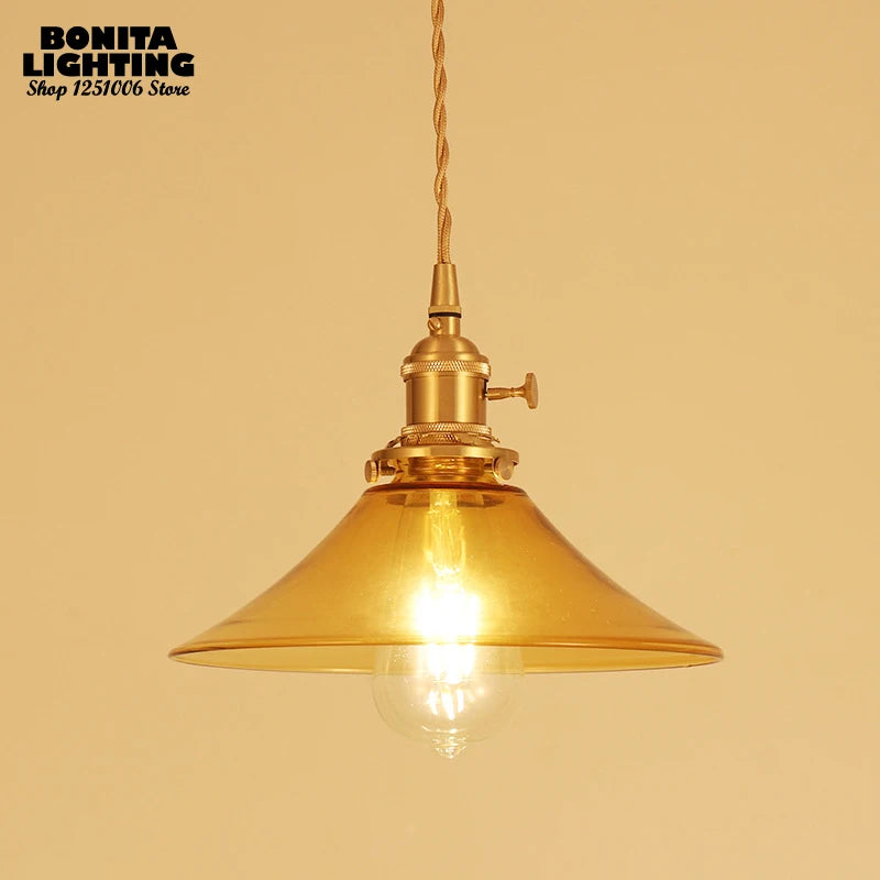 Vintage glass pendant light with brass base and switch