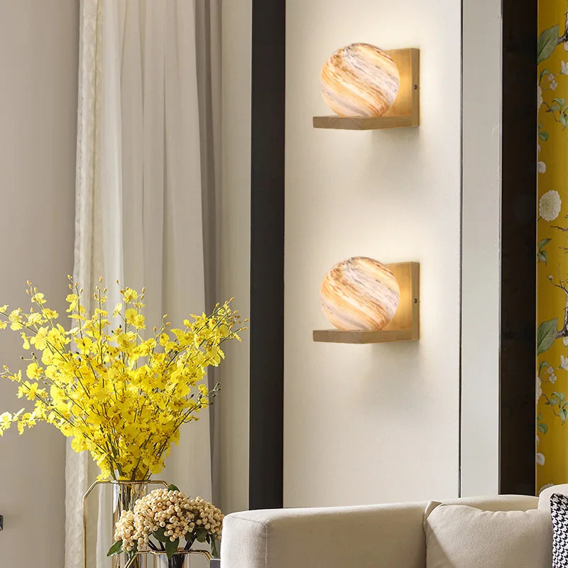 Modern wooden wall light with planet LED shade