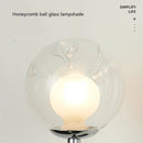 Up and down wall light with chrome metal and honeycomb glass