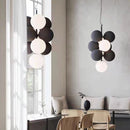 Pendant light with adjustable cord and PVC sphere