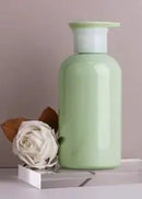set of refillable lotion pump bottles and soap dispensers