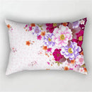 Decorative cushion cover with rainbow, red and pink flowers