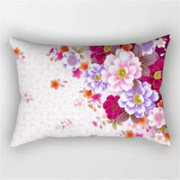 Decorative cushion cover with rainbow, red and pink flowers