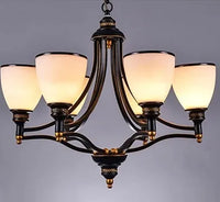 Vintage iron and bronze chandelier with glass shade, loft style
