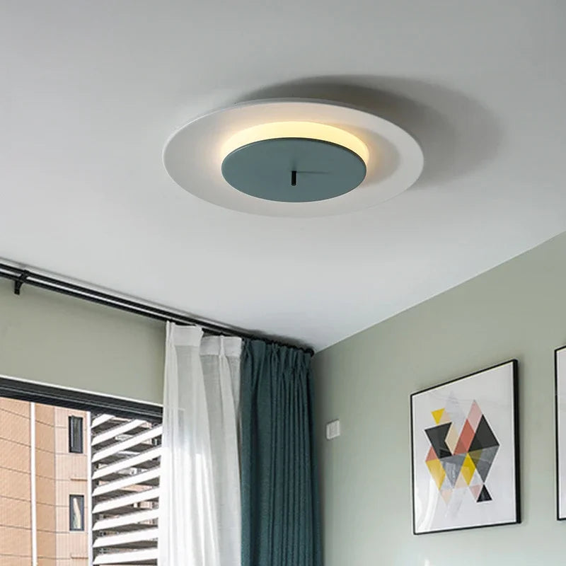 Modern minimalist iron and acrylic ceiling light with colourful LED lighting