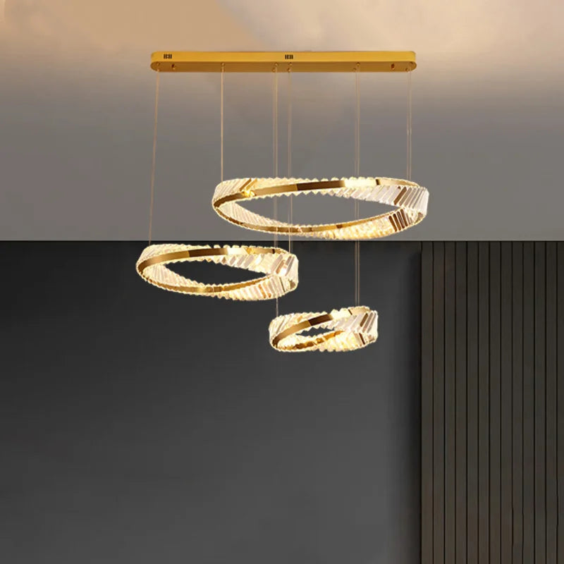 Modern gold LED pendant light with elegant crystal