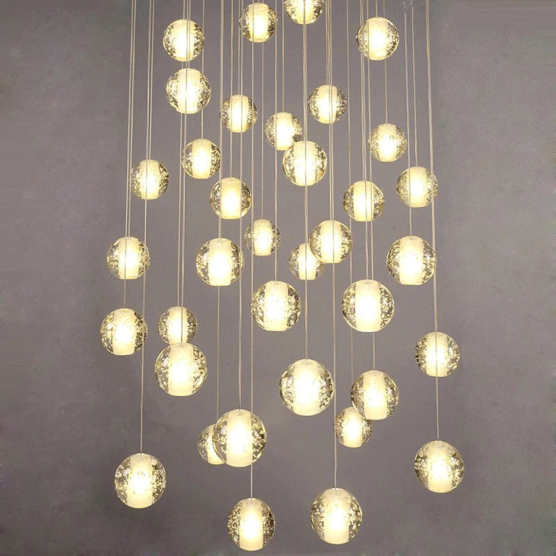 Modern crystal chandelier with rotating LED ball pendant